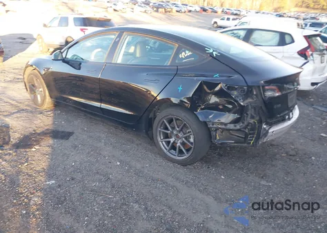 2021 Tesla Model 3 Standard Range Plus Rear-Wheel Drive from USA, damaged, VIN 5YJ3E1EA7MF090339